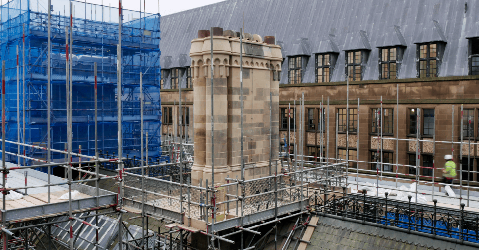 Lyons Stonework team performing heritage restoration with skilled fixer masons and intricate stone carving.