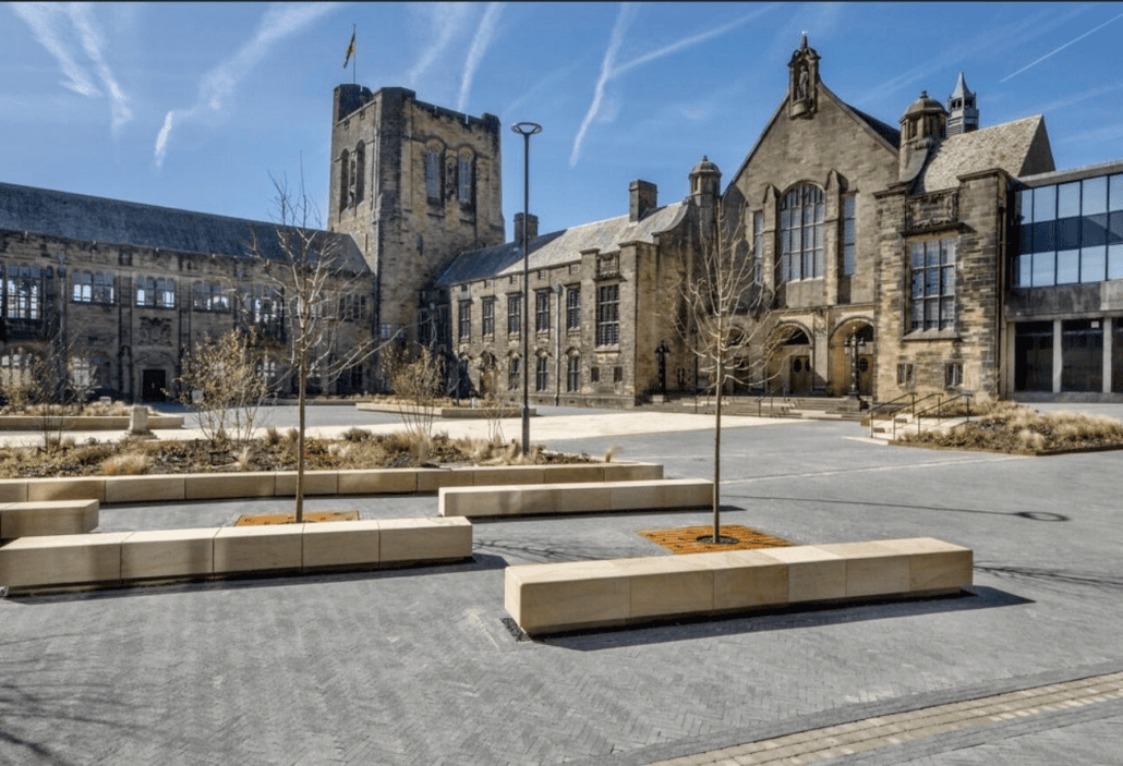 Public realm seating crafted from natural British sandstone, featuring a sleek and durable design, perfectly suited for hardscaping projects in urban spaces.
