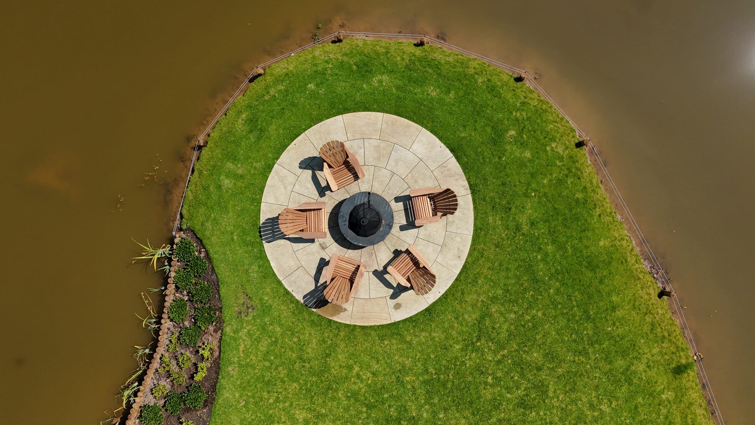 Lyons Stonework creating custom radius paving, adding elegant curves to patios, pathways, and public spaces.
